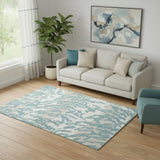 5' X 8' Teal And Ivory Animal Print Washable Area Rug With UV Protection
