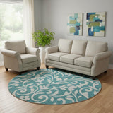 8' Teal And Ivory Floral Washable Round Rug With UV Protection