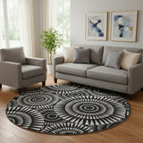 8' Black And Ivory Geometric Washable Round Rug With UV Protection