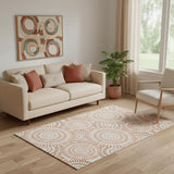 5' X 8' Coral And Ivory Geometric Washable Area Rug With UV Protection
