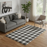 5' X 8' Black And Ivory Plaid Washable Area Rug With UV Protection