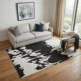 5' X 8' Black And Ivory Abstract Washable Area Rug With UV Protection