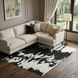 8' X 10' Black And Ivory Abstract Washable Area Rug With UV Protection