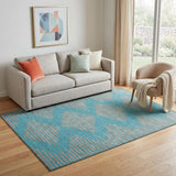 5' X 8' Teal And Peach Geometric Washable Area Rug With UV Protection