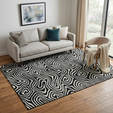5' X 8' Black And Ivory Abstract Washable Area Rug With UV Protection
