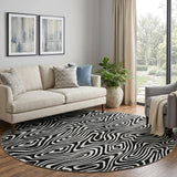 8' Black And Ivory Abstract Washable Round Rug With UV Protection