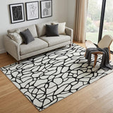 5' X 8' Ivory And Black Geometric Washable Area Rug With UV Protection