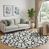 8' Ivory And Black Geometric Washable Round Rug With UV Protection