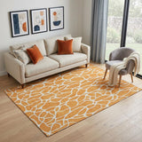 5' X 8' Orange And Ivory Geometric Washable Area Rug With UV Protection