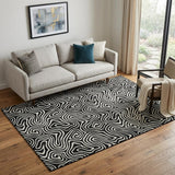 5' X 8' Black And Ivory Abstract Washable Area Rug With UV Protection