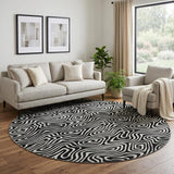 8' Black And Ivory Abstract Washable Round Rug With UV Protection