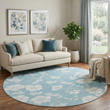 8' Sky Blue And Ivory Floral Washable Round Rug With UV Protection
