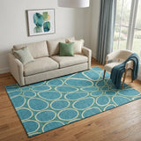 5' X 8' Teal Ivory And Green Geometric Washable Area Rug With UV Protection