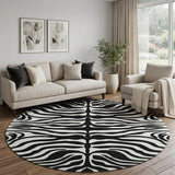 8' Black And Ivory Animal Print Washable Round Rug With UV Protection