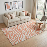 5' X 8' Coral And Ivory Animal Print Washable Area Rug With UV Protection