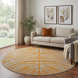 8' Orange And Gray Animal Print Washable Round Rug With UV Protection