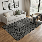 5' X 8' Black And Ivory Geometric Washable Area Rug With UV Protection