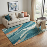 5' X 8' Teal Orange And Ivory Abstract Washable Area Rug With UV Protection