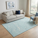 5' X 8' Aqua Teal And Ivory Abstract Washable Area Rug With UV Protection