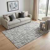 5' X 8' Gray Silver And Ivory Abstract Geometric Washable Area Rug With UV Protection