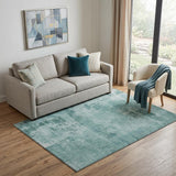 5' X 8' Teal And Aqua Abstract Washable Area Rug With UV Protection