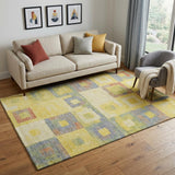 5' X 8' Yellow Orange Purple And Ivory Geometric Washable Area Rug With UV Protection