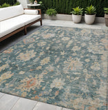 5' X 8' Teal Blue Beige And Gold Floral Washable Indoor Outdoor Area Rug