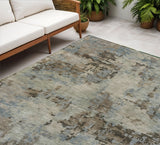 5' X 8' Beige Gray And Chocolate Abstract Washable Indoor Outdoor Area Rug