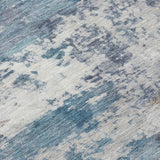 5' X 8' Blue And Ivory Abstract Washable Indoor Outdoor Area Rug