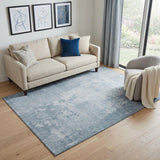 5' X 8' Sky Blue And Ivory Abstract Washable Area Rug With UV Protection