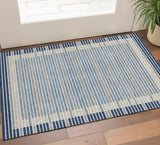 3' X 5' Navy Blue Ivory And Gray Striped Washable Area Rug With UV Protection