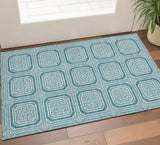3' X 5' Teal And Ivory Geometric Washable Area Rug With UV Protection