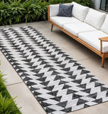 10' Ivory And Black Geometric Indoor Outdoor Runner Rug