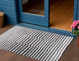 3' X 5' Ivory And Black Striped Indoor Outdoor Area Rug