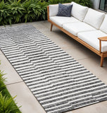 8' Black And Ivory Striped Indoor Outdoor Runner Rug