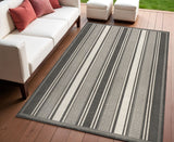4' X 6' Black And Cream Striped Indoor Outdoor Area Rug