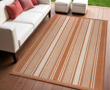 4' X 6' Orange And Cream Striped Indoor Outdoor Area Rug