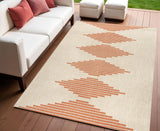 4' X 6' Beige And Orange Abstract Indoor Outdoor Area Rug