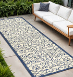 10' Navy Blue And Beige Geometric Indoor Outdoor Runner Rug