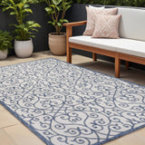 8' X 10' Navy Blue And Beige Geometric Indoor Outdoor Area Rug