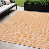 5' X 8' Orange And Cream Striped Indoor Outdoor Area Rug