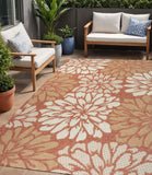 5' X 8' Orange And Cream Floral Indoor Outdoor Area Rug