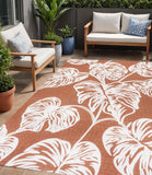 5' X 8' Orange And Ivory Floral Indoor Outdoor Area Rug