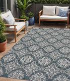 5' X 8' Turquoise And Cream Floral Indoor Outdoor Area Rug