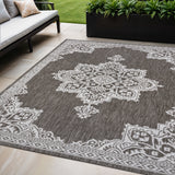 5' X 8' Light Brown And Cream Medallion Indoor Outdoor Area Rug