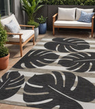 5' X 8' Black And Beige Floral Indoor Outdoor Area Rug