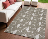 4' X 6' Beige And White Animal Print Indoor Outdoor Area Rug