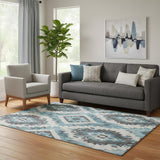 5' X 8' Teal Charcoal And Ivory Southwestern Washable Area Rug With UV Protection