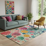 5' X 8' Teal Pink And Orange Geometric Washable Area Rug With UV Protection