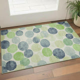 3' X 5' Navy Blue Green And Ivory Geometric Washable Area Rug With UV Protection